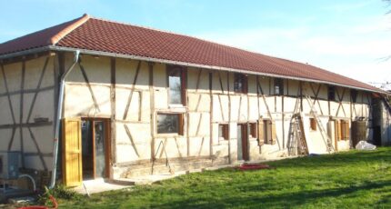 Rénovation par Maisons France Confort d'une ferme Bressane à Jayat (01) dans le département de l'Ain